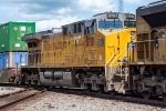 UP 5701 trails on a southbound intermodal